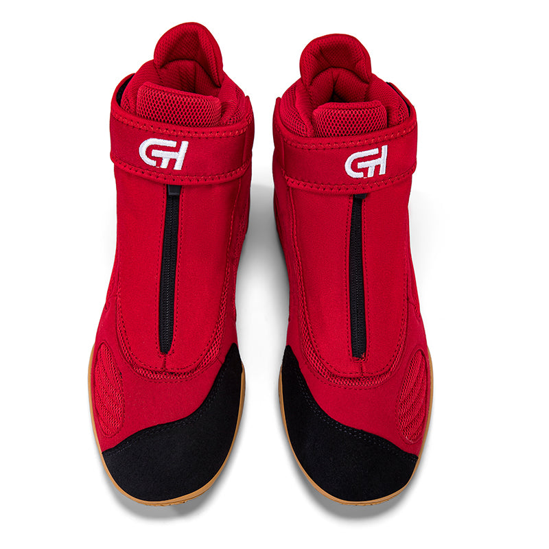 A pair of red CH Gear XXVI Bloodline Wrestling Shoe with black toe caps and a white 'CH' logo on the ankle strap, shown from a top-down view on a white background.