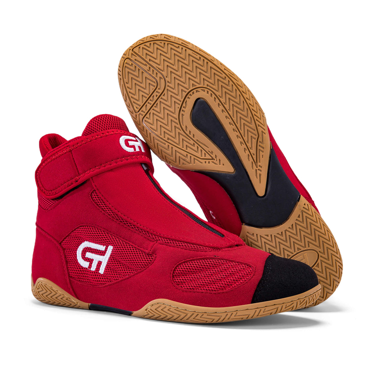 A pair of red high-top CH Gear XXVI Bloodline Wrestling shoes with black toe caps and black heel accents, featuring a tan zigzag-patterned outsole. One shoe is shown from the side and front, while the other is turned to display the sole.