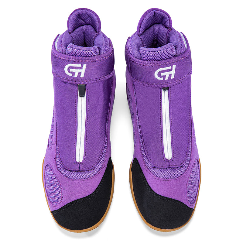 A pair of purple high-top ch gear wrestling shoes with black toe caps, white vertical zipper details, and white 'GH' logos on the side, shown against a plain white background.
